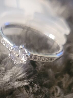 Classic Solitaire Halo Engagement Ring in Silver with Clear Stones